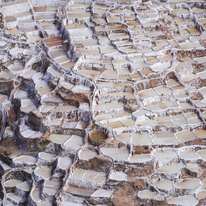 white and brown concrete brick wall