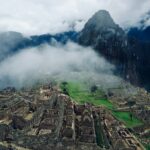 bird's-eye view of village in between mountain