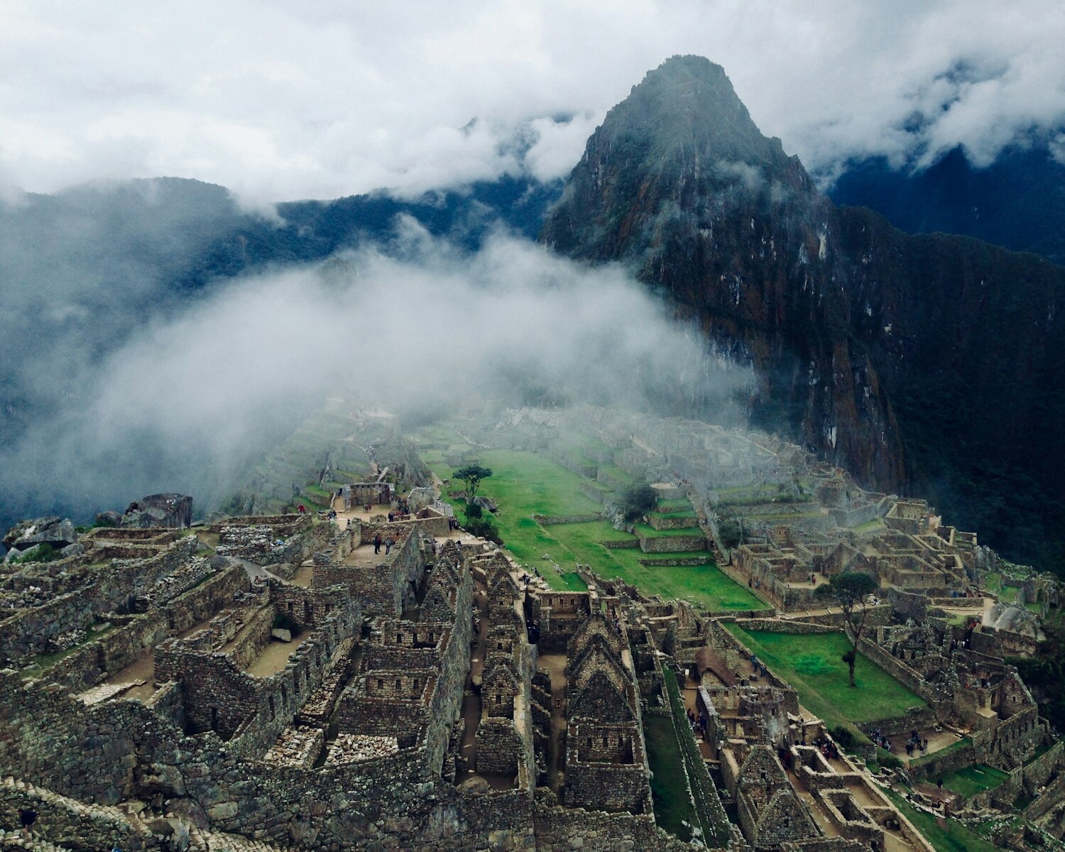 bird's-eye view of village in between mountain