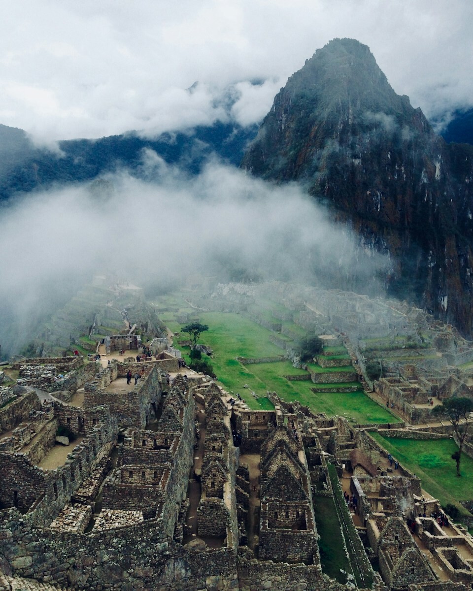 bird's-eye view of village in between mountain