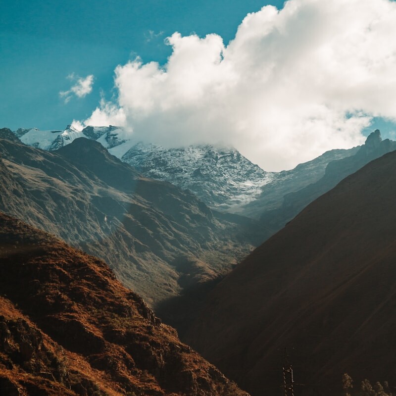 green and brown mountains at daytime