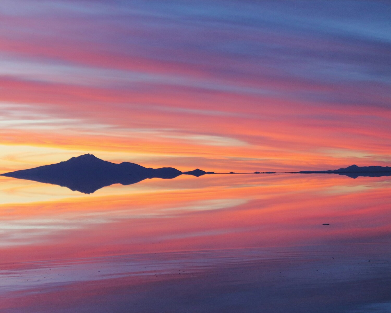 a sunset over a beach