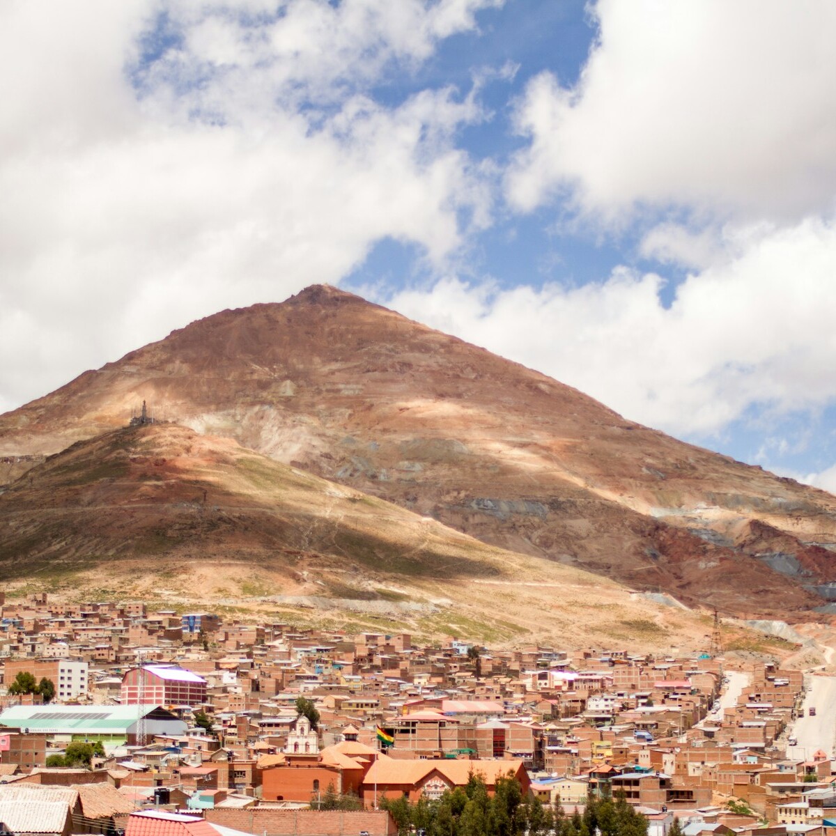 a city with a mountain in the background