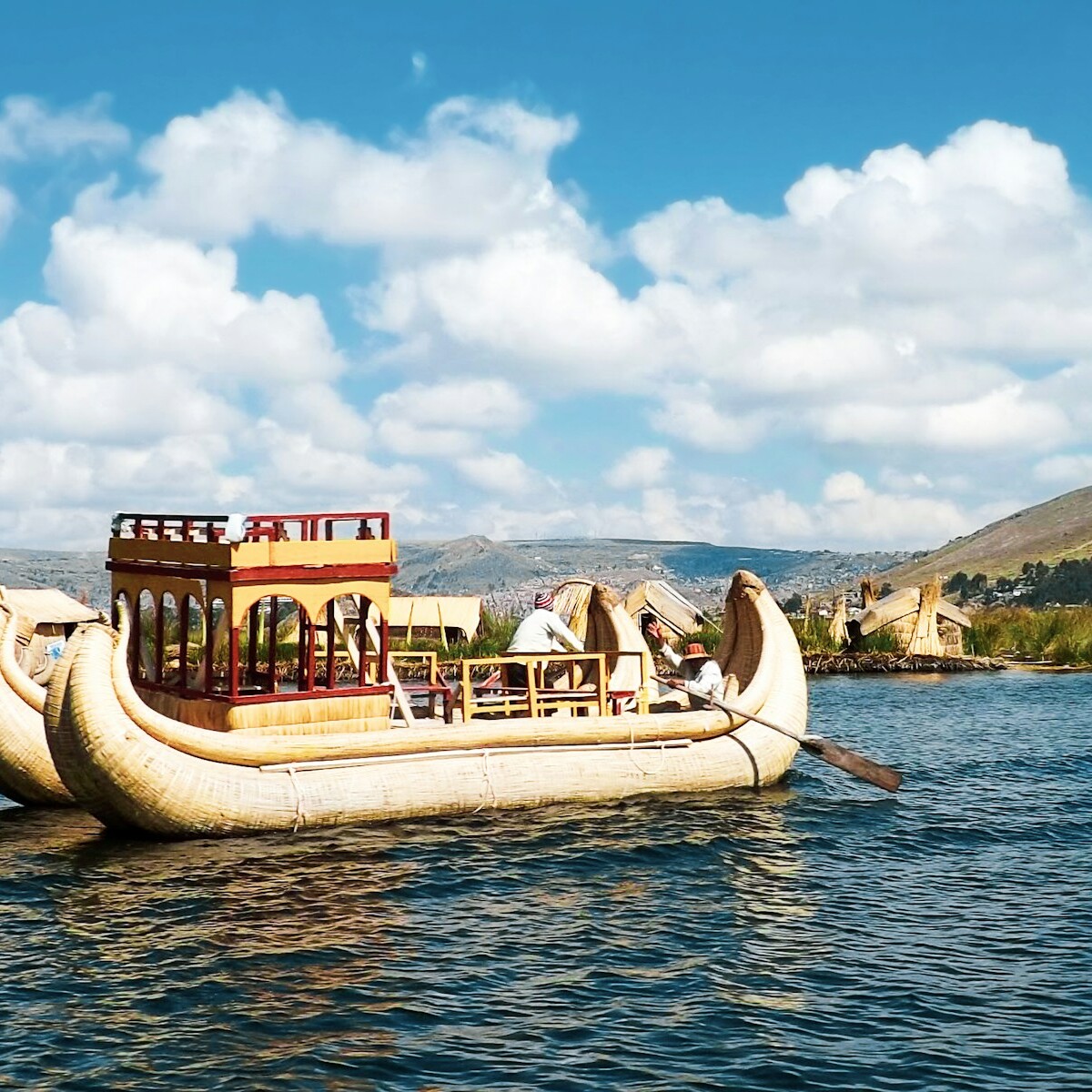 brown and white boat on water during daytime