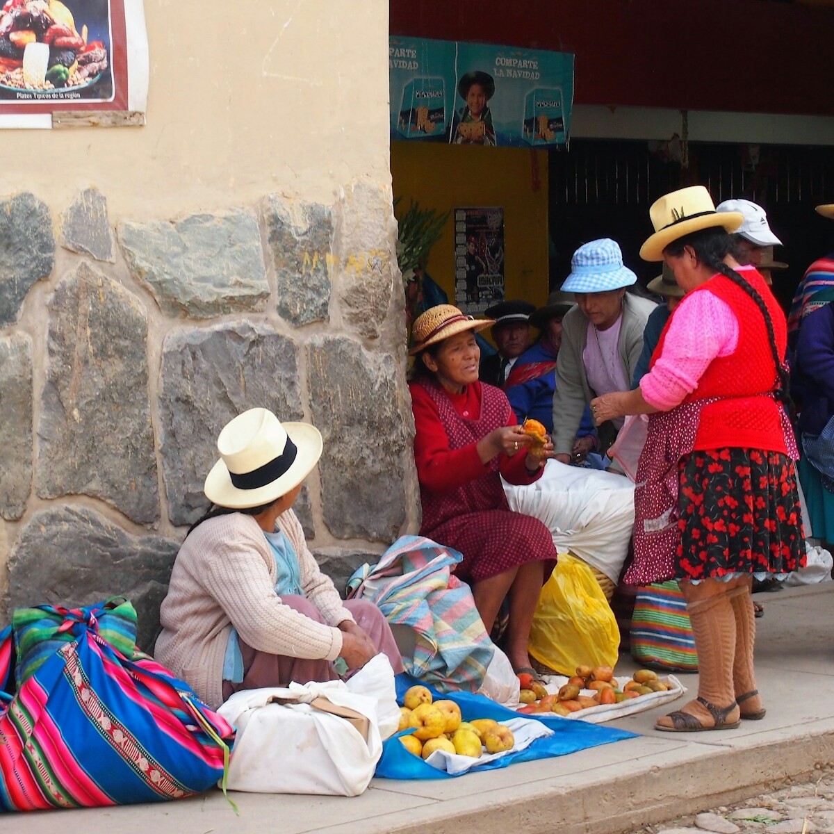 people sitting on concrete stairs during daytime